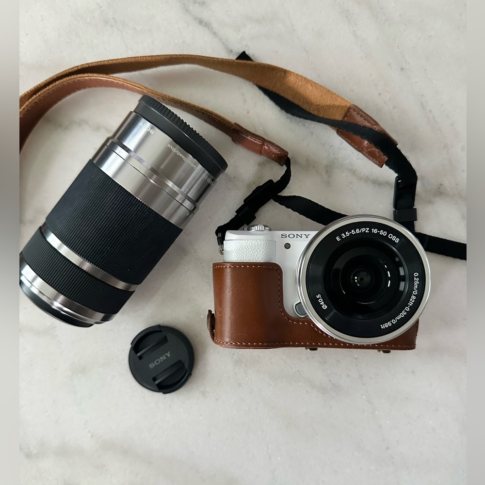 Sony a-5100 White Camera with Brown faux Leather Cover + E55-210 Lens+32 GB SD